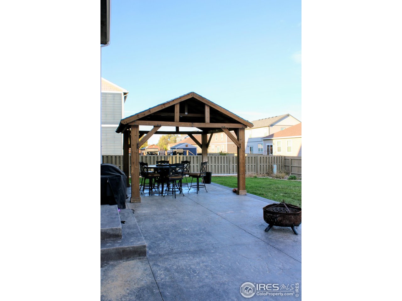 415 3rd Street Severance, CO 80550 - Photo 23 of 25 a view of a bench in a patio