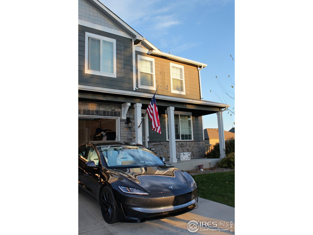 415 3rd Street Severance, CO 80550 - Photo 24 of 25 a car parked in front of a building