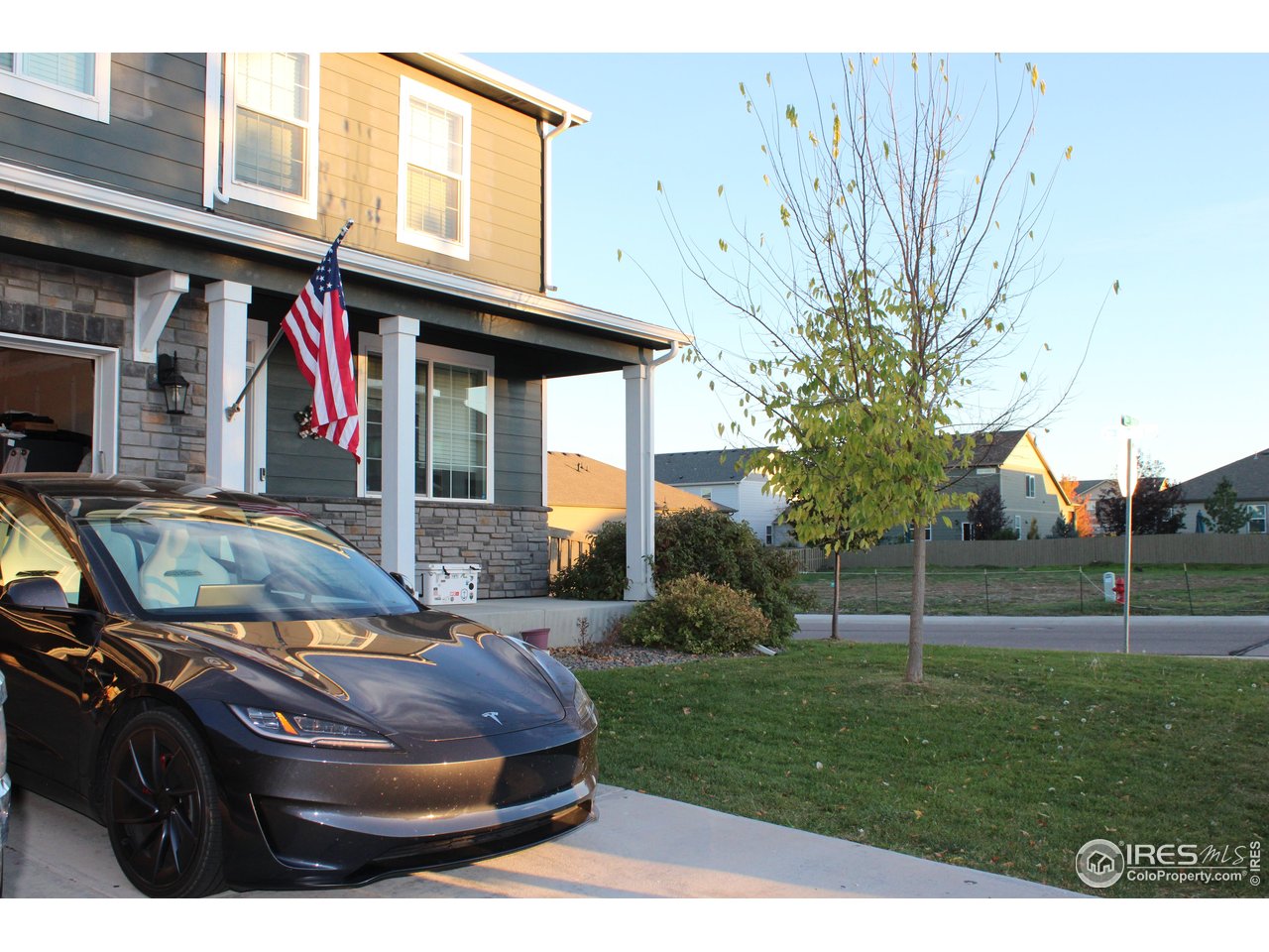 415 3rd Street Severance, CO 80550 - Photo 25 of 25 a front view of a house with garden