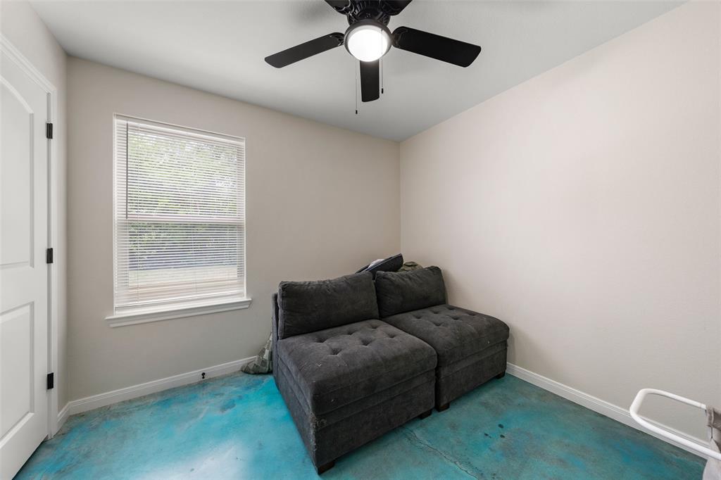 3109 North 27th Street Waco, TX 76708 - Photo 12 of 17 a living room with furniture and a window