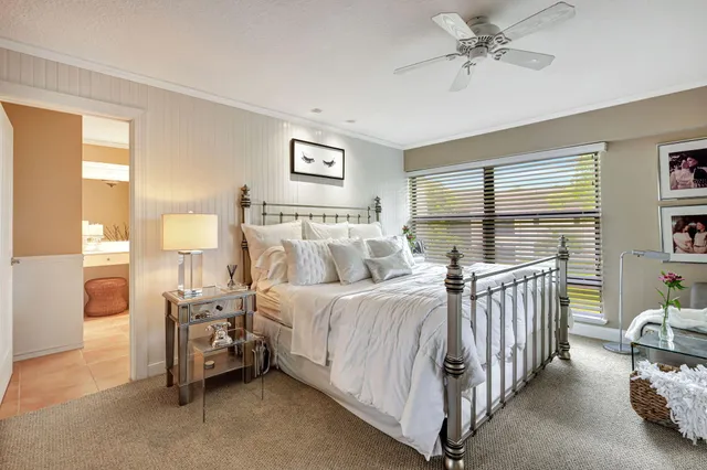 a bathroom with a shower and a toilet