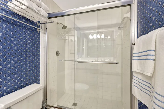 a view of balcony with furniture