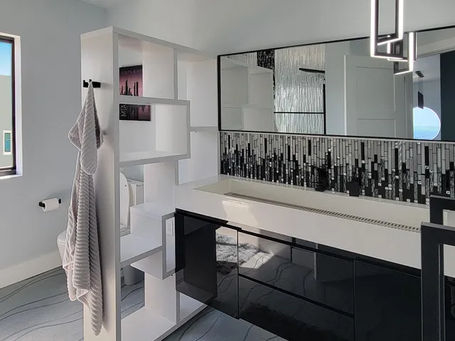 a utility room with sink dryer and washer