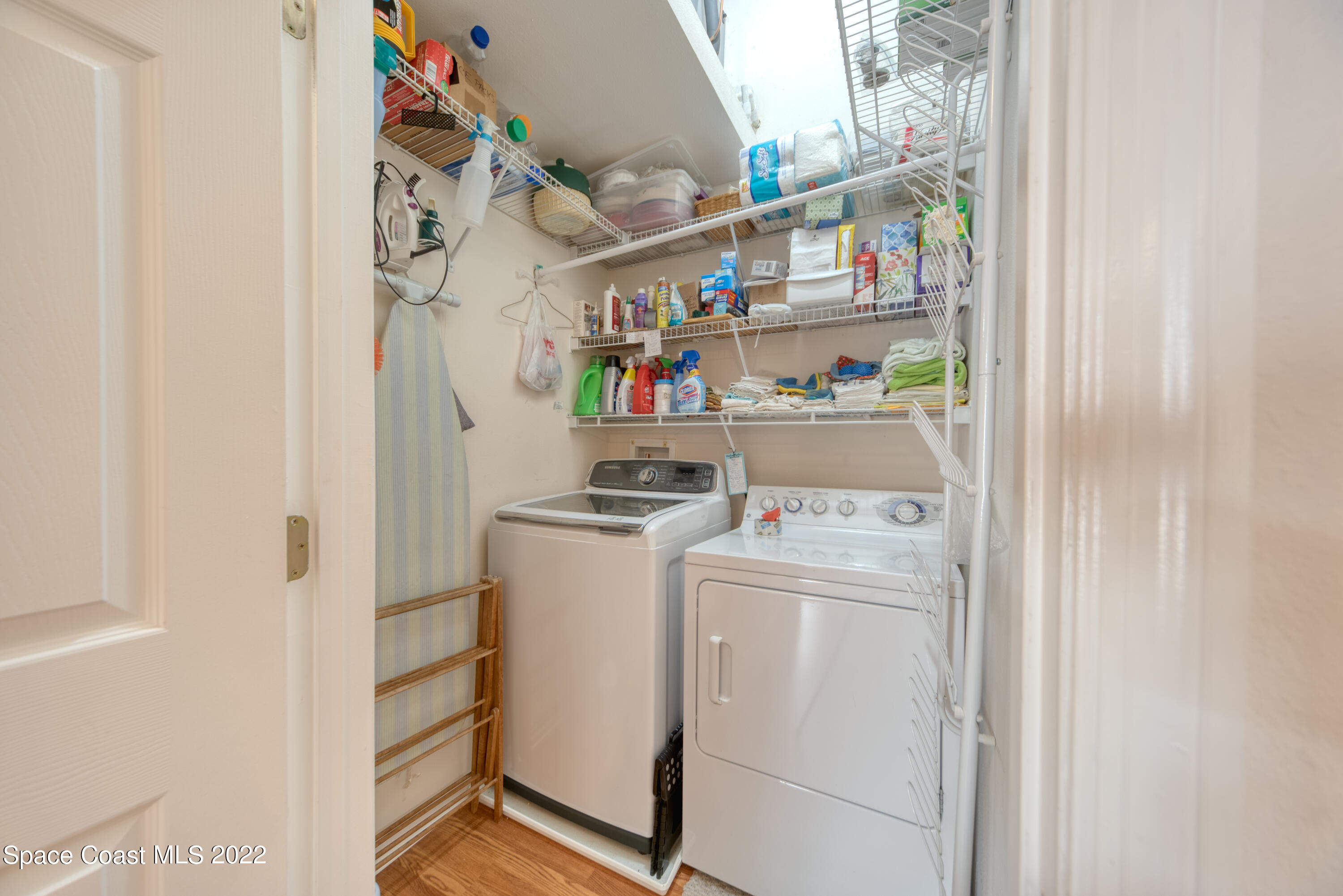 995 Luminary Circle, Unit 103 Melbourne, FL 32901 - Photo 15 of 27 a utility room with dryer and washer