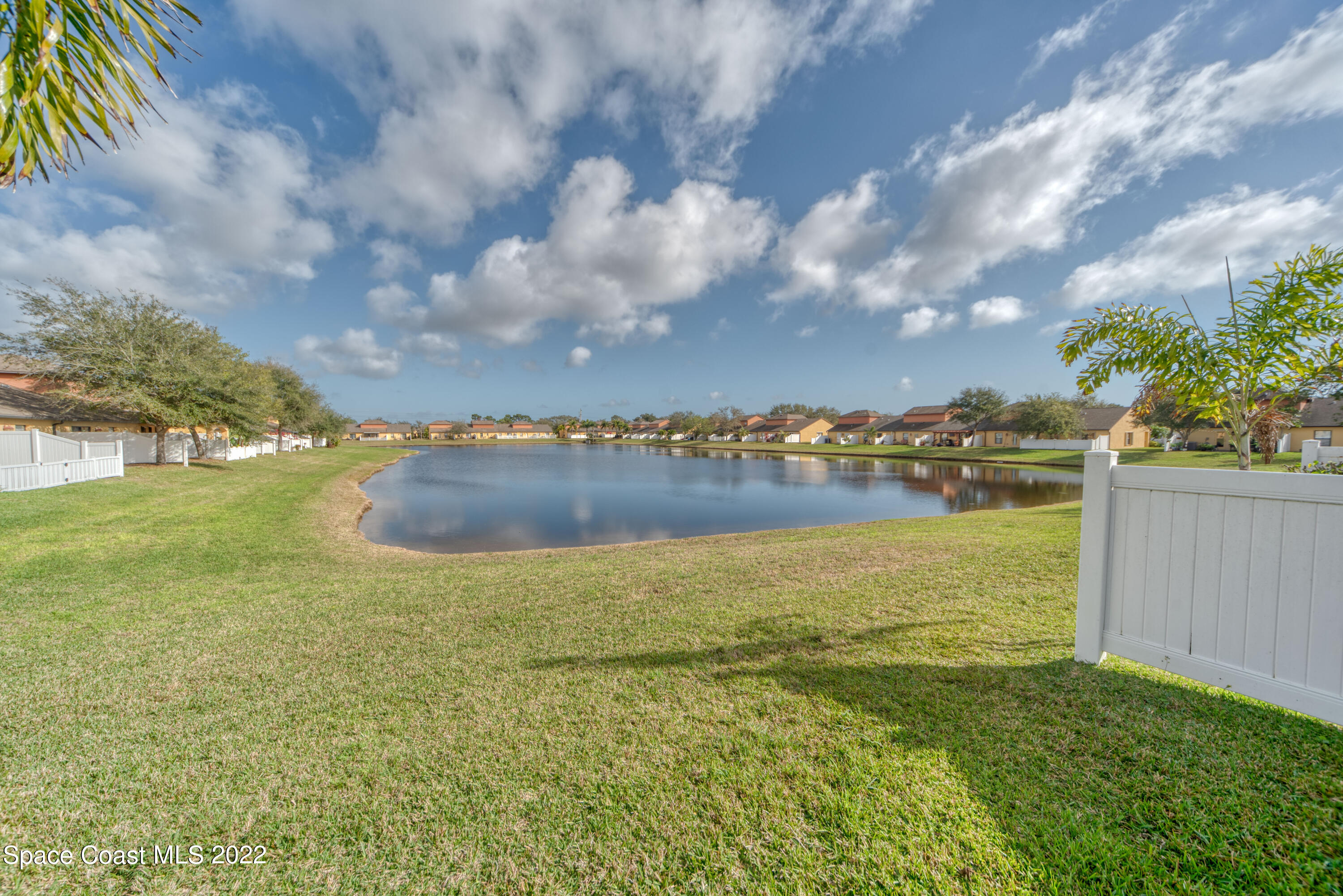 995 Luminary Circle, Unit 103 Melbourne, FL 32901 - Photo 17 of 27 a view of an ocean and beach