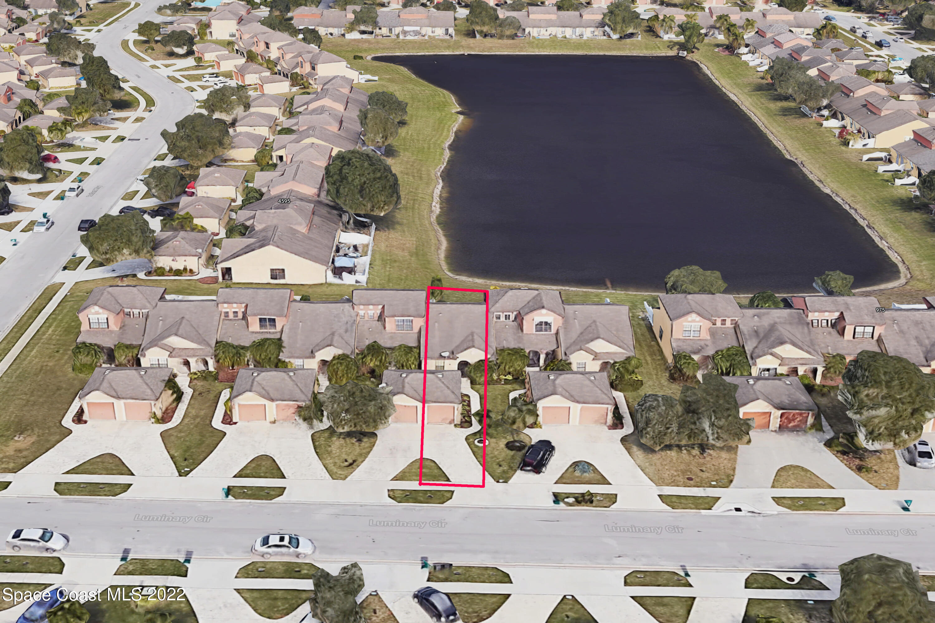 995 Luminary Circle, Unit 103 Melbourne, FL 32901 - Photo 27 of 27 an aerial view of a house with a backyard