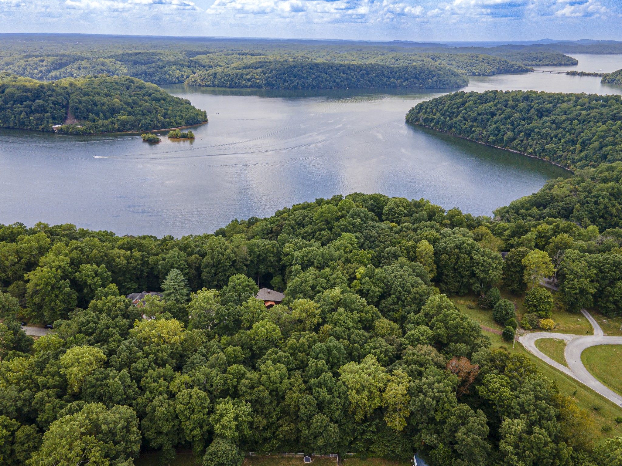 0 Fire Lake Drive Manchester, TN 37355 - Photo 4 of 7 an aerial view of a house with a yard and lake view