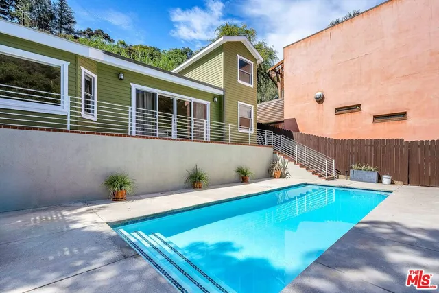 a house view with a outdoor space