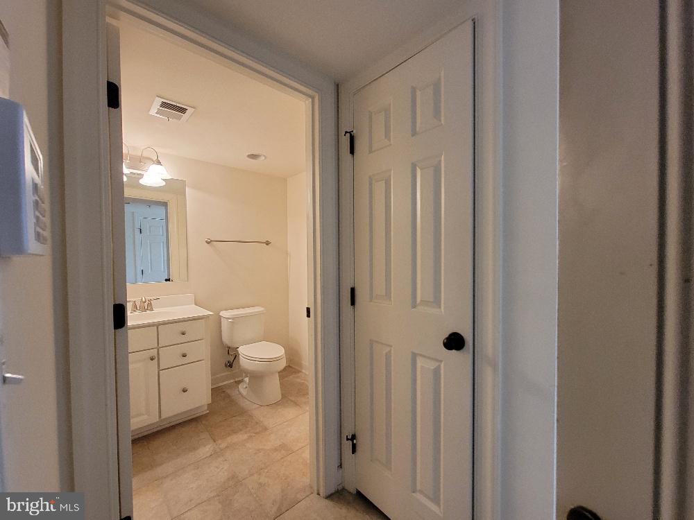 806 West Glebe Road Alexandria, VA 22305 - Photo 21 of 22 Basement Family Room Half Bath