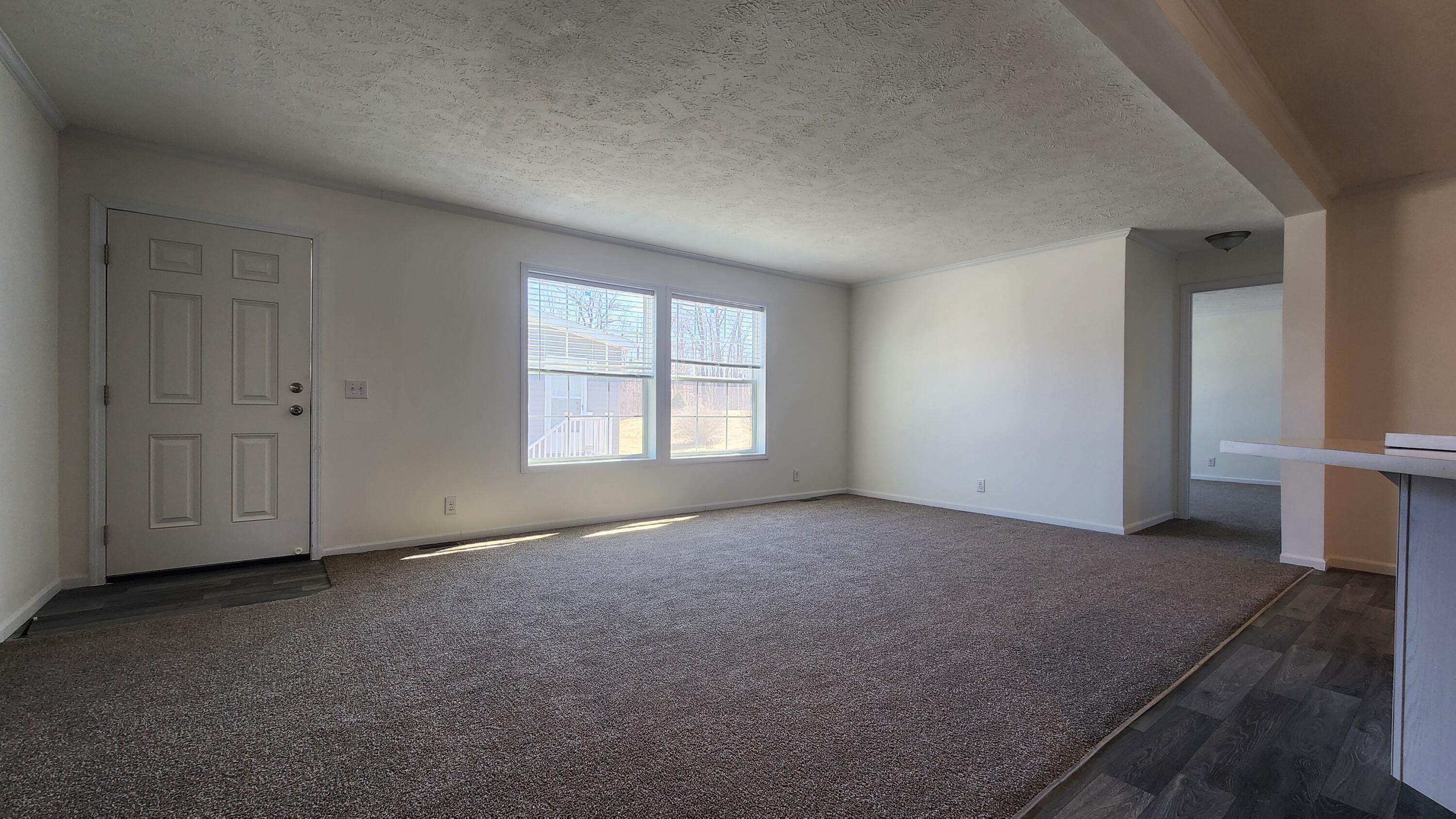 884 Ottawa Court, Unit 7 Charlotte, MI 48813 - Photo 4 of 17 20250317_125129