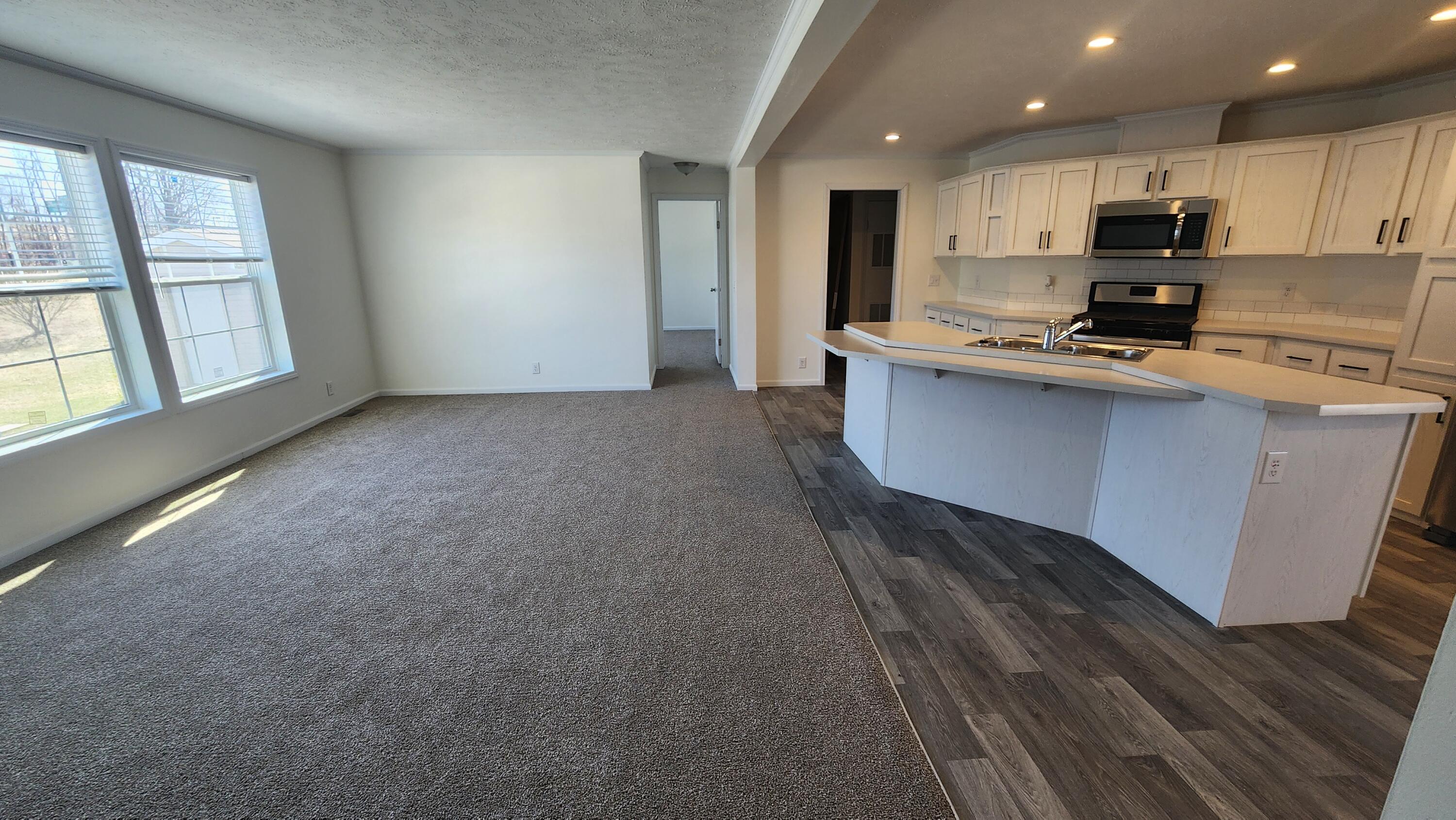 884 Ottawa Court, Unit 7 Charlotte, MI 48813 - Photo 5 of 17 20250317_125648