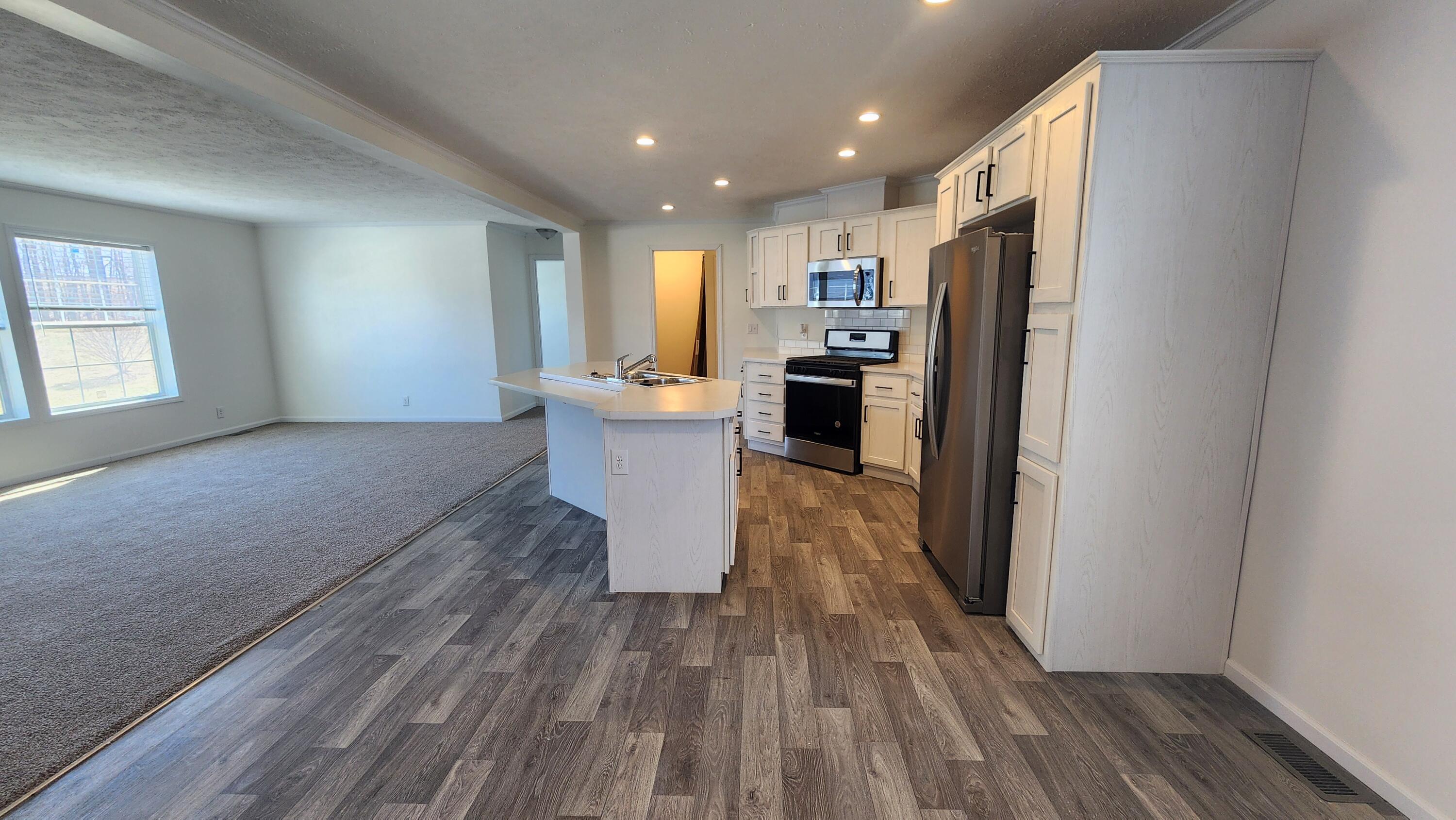 884 Ottawa Court, Unit 7 Charlotte, MI 48813 - Photo 6 of 17 20250317_125147