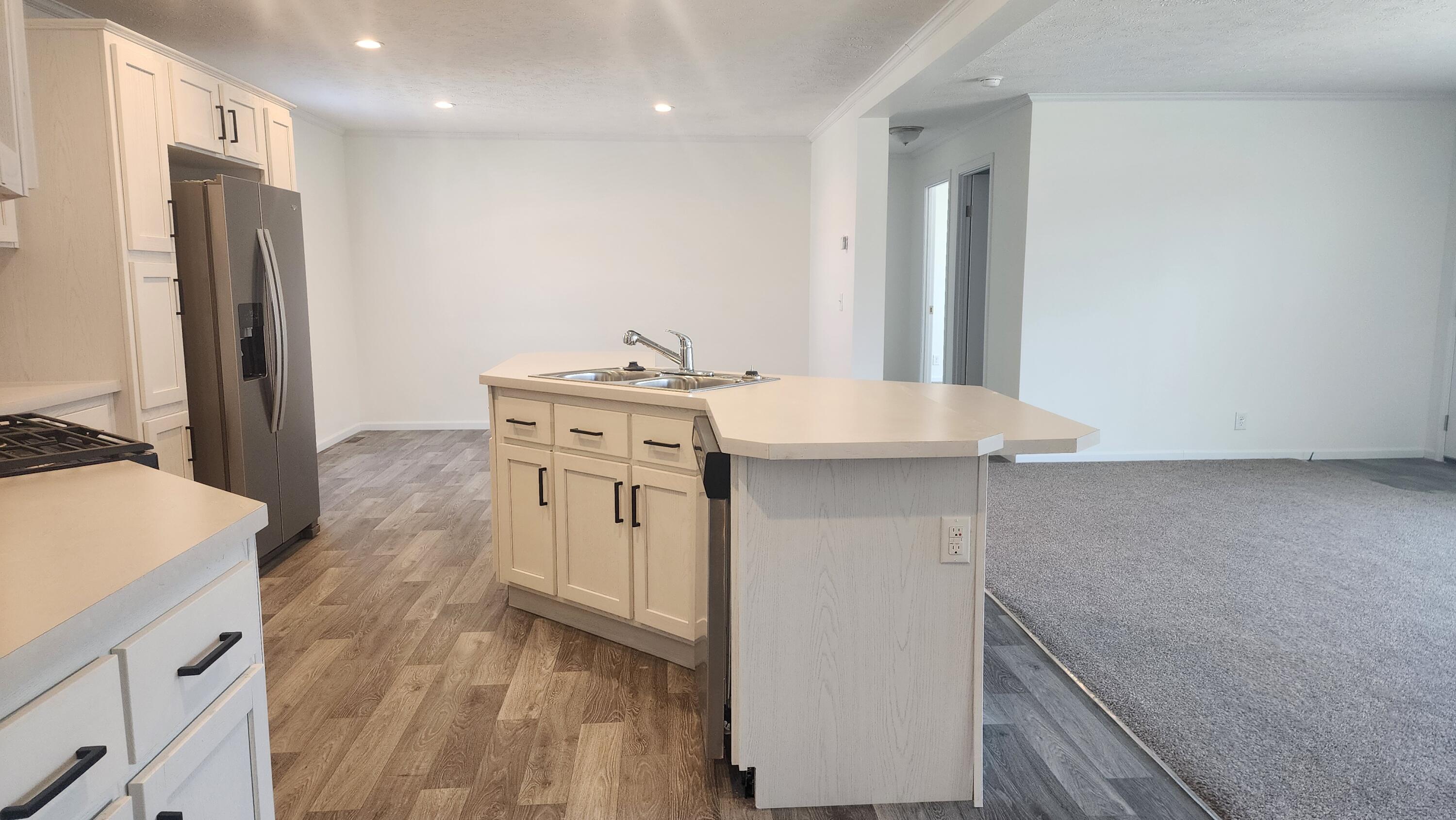 884 Ottawa Court, Unit 7 Charlotte, MI 48813 - Photo 7 of 17 20250317_125330