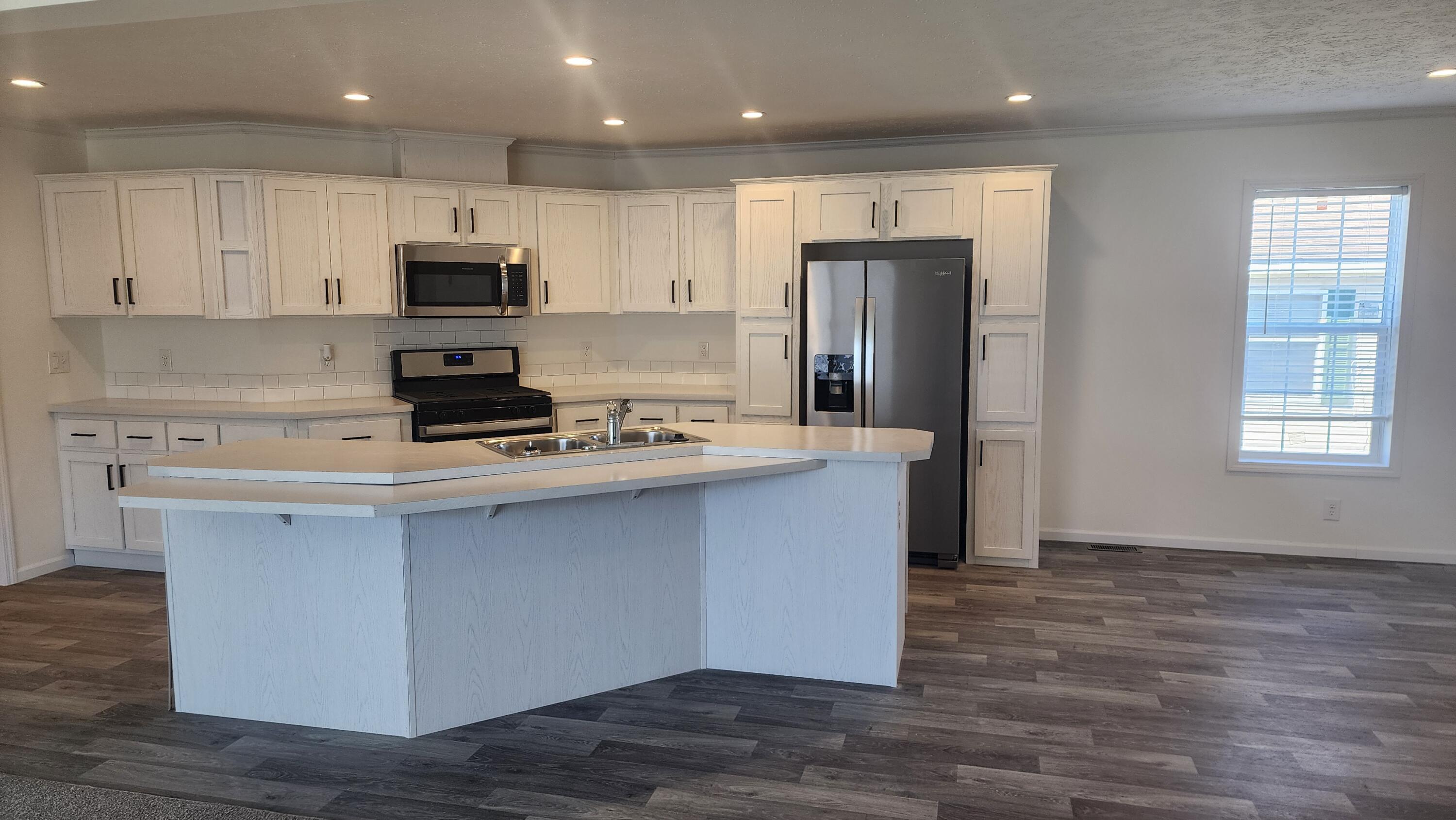 884 Ottawa Court, Unit 7 Charlotte, MI 48813 - Photo 8 of 17 20250317_125053