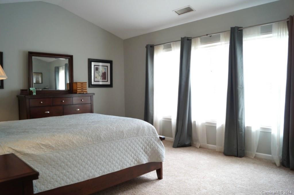 2224 Winthorp Ridge Road Charlotte, NC 28270 - Photo 12 of 24 a bedroom with a bed and a dresser