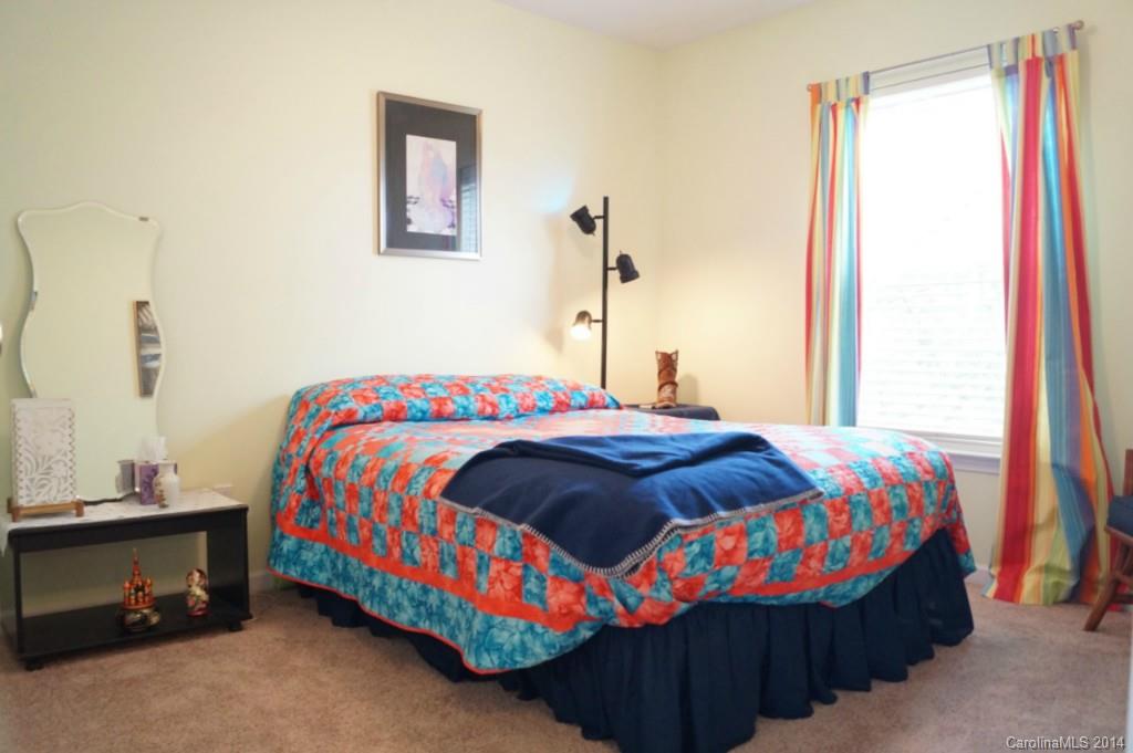 2224 Winthorp Ridge Road Charlotte, NC 28270 - Photo 18 of 24 a bedroom with a bed and a window
