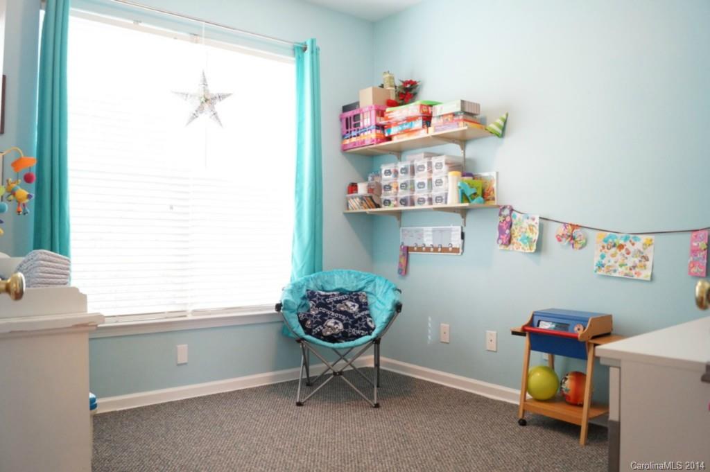 2224 Winthorp Ridge Road Charlotte, NC 28270 - Photo 5 of 24 a room with toys and a window