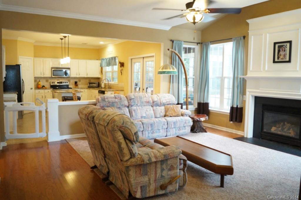 2224 Winthorp Ridge Road Charlotte, NC 28270 - Photo 6 of 24 a living room with furniture fireplace and a large window