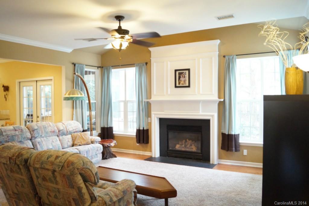 2224 Winthorp Ridge Road Charlotte, NC 28270 - Photo 7 of 24 a living room with furniture and a fireplace