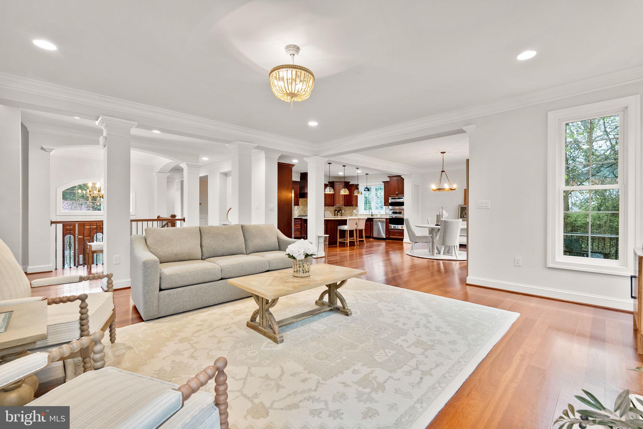 8522 Lewinsville Road McLean, VA 22102 - Photo 2 of 51 a living room with furniture and wooden floor