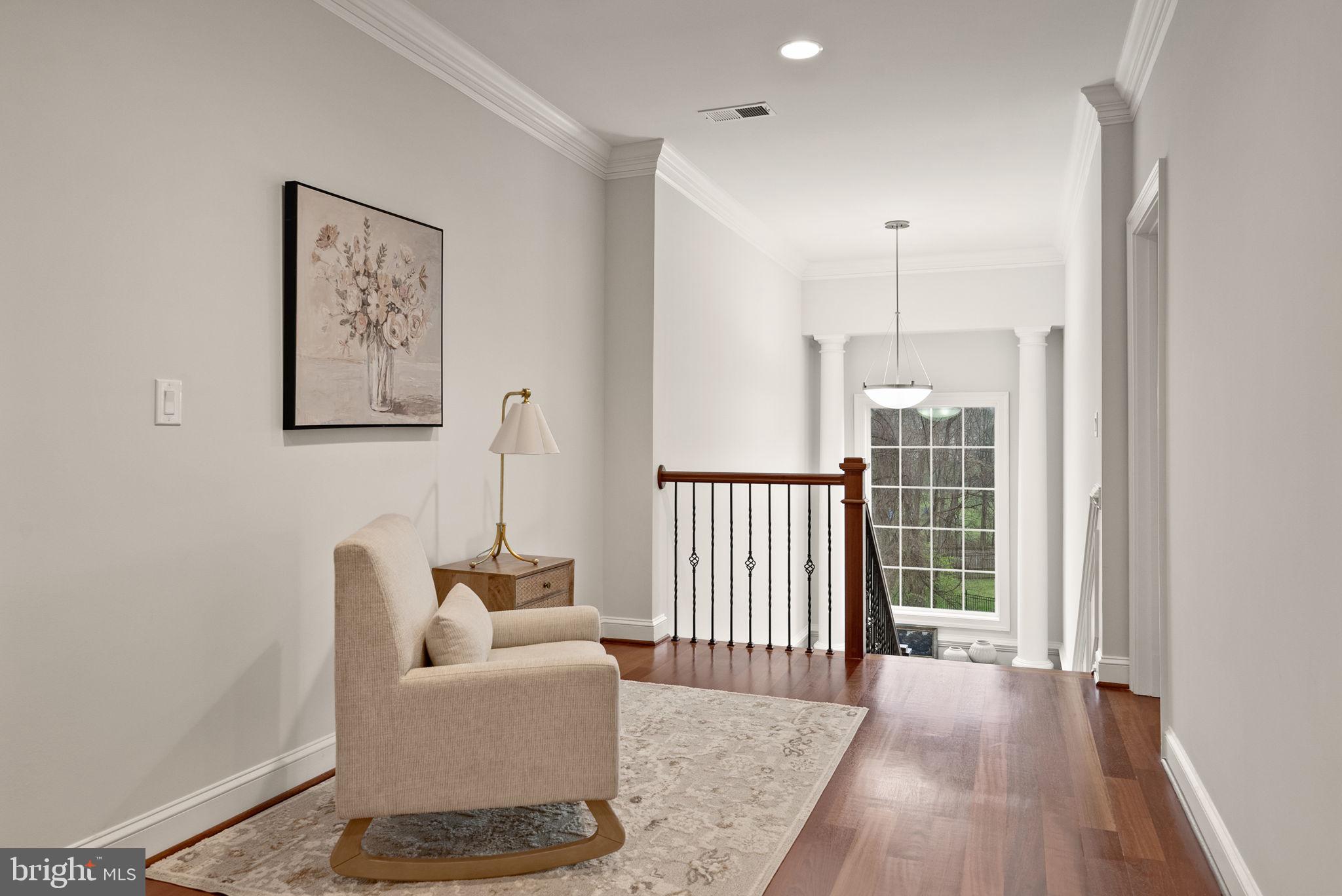 8522 Lewinsville Road McLean, VA 22102 - Photo 25 of 51 a hallway with a couch and a window