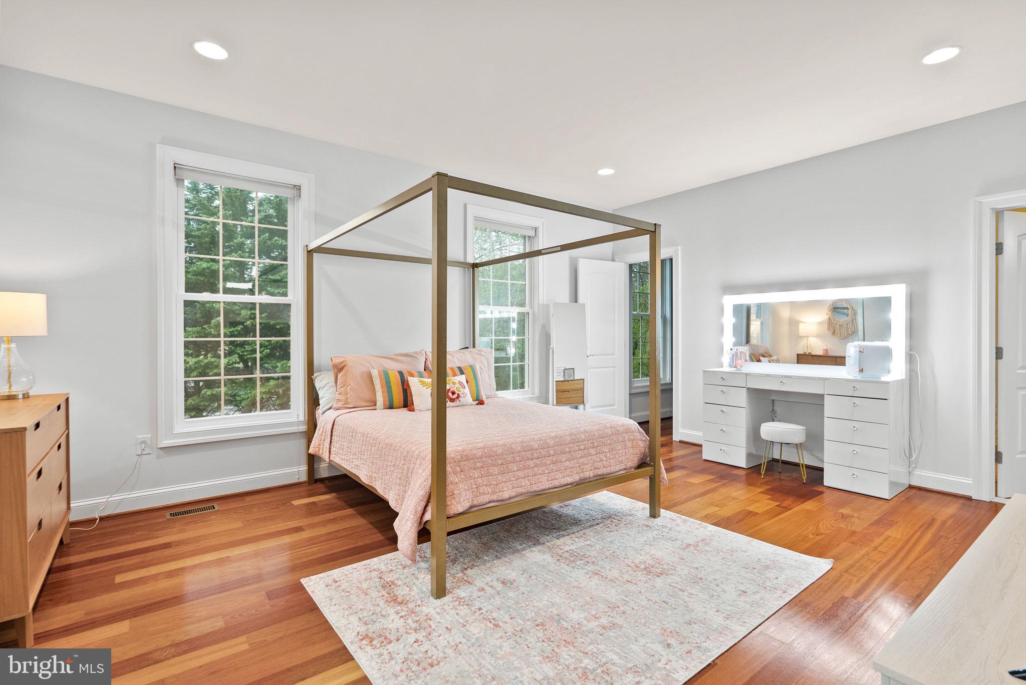 8522 Lewinsville Road McLean, VA 22102 - Photo 26 of 51 a bedroom with a bed table and window