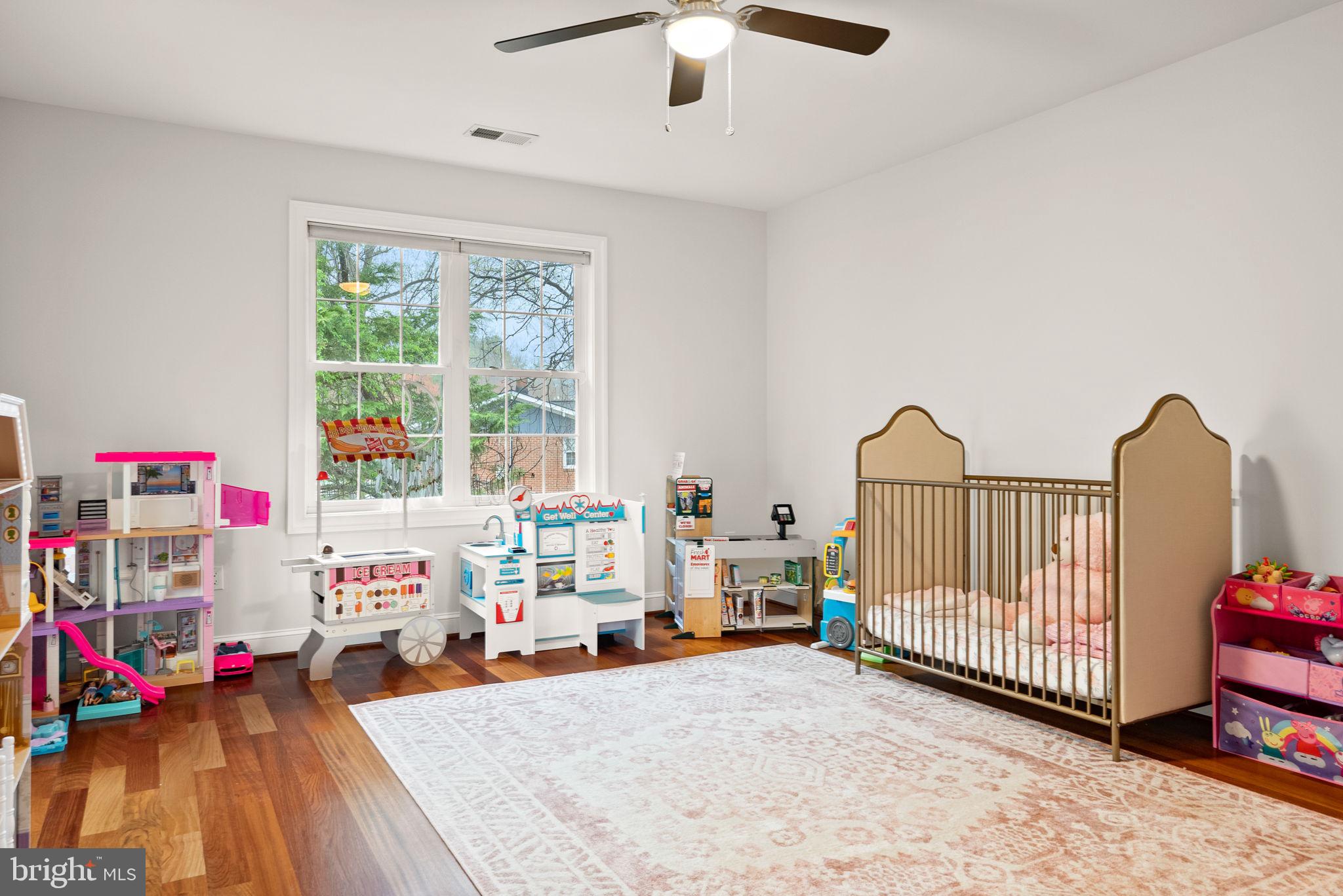 8522 Lewinsville Road McLean, VA 22102 - Photo 29 of 51 a view of a room with toys and a couch