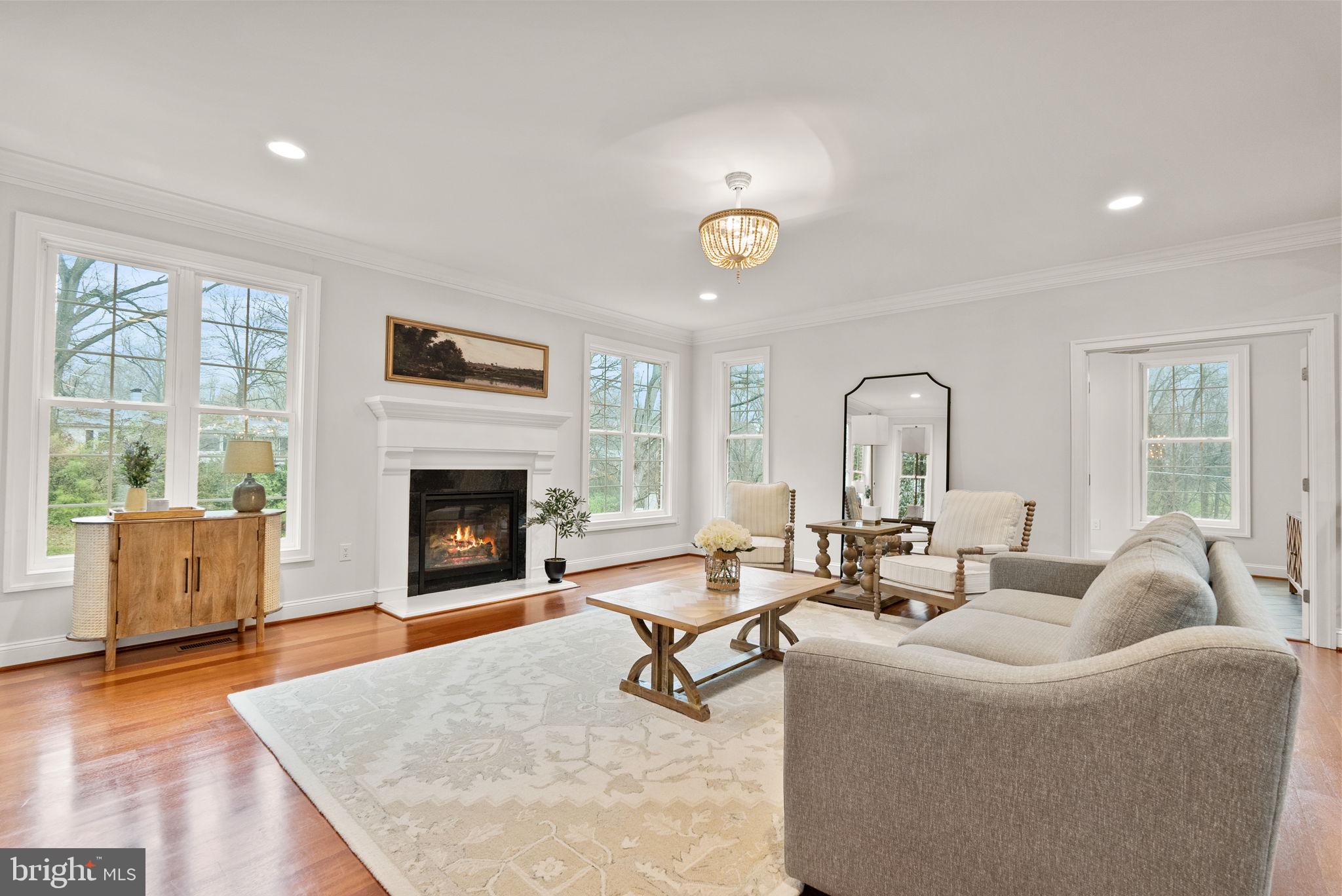 8522 Lewinsville Road McLean, VA 22102 - Photo 3 of 51 a living room with furniture and a fireplace