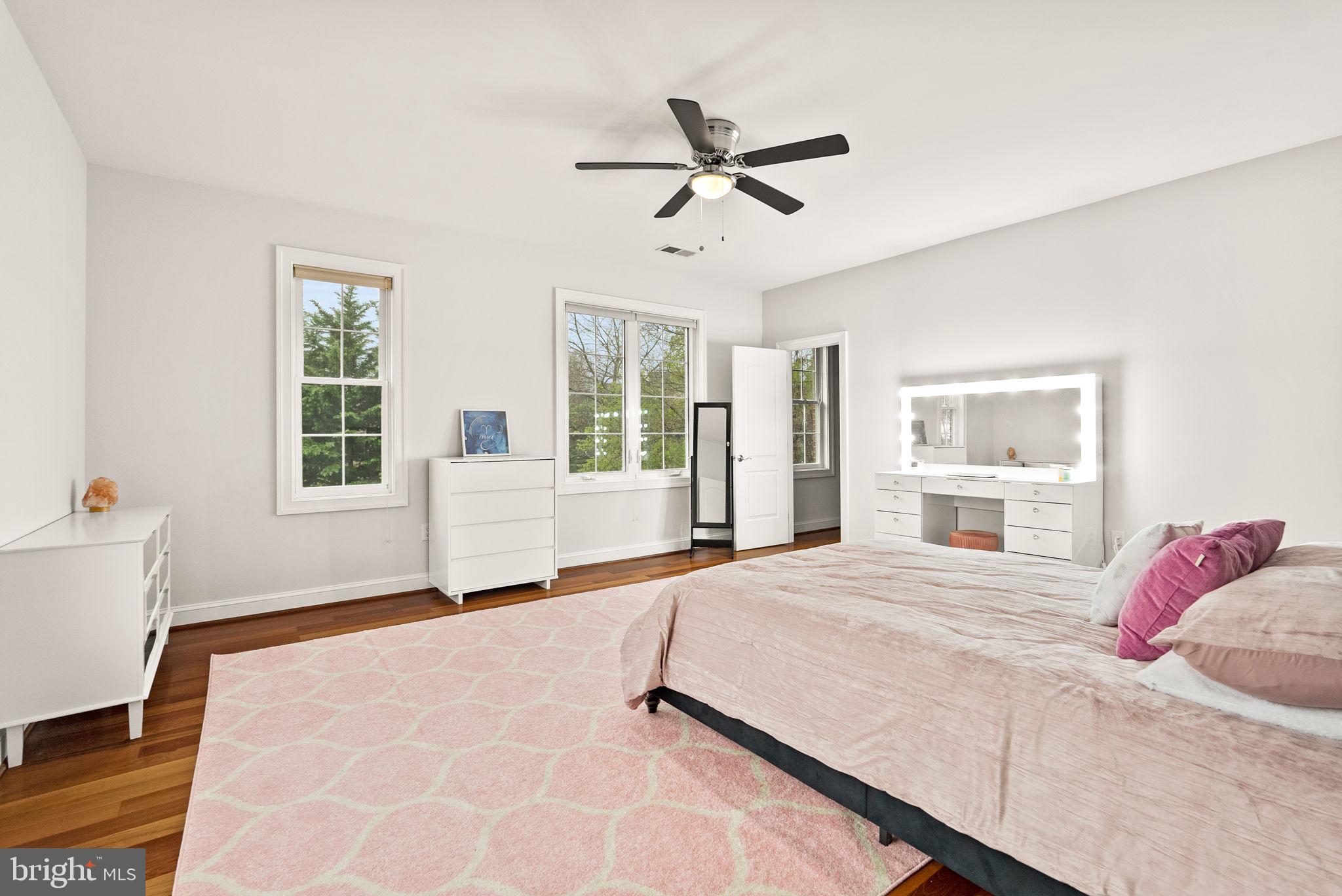 8522 Lewinsville Road McLean, VA 22102 - Photo 31 of 51 a bedroom with a large bed and a window