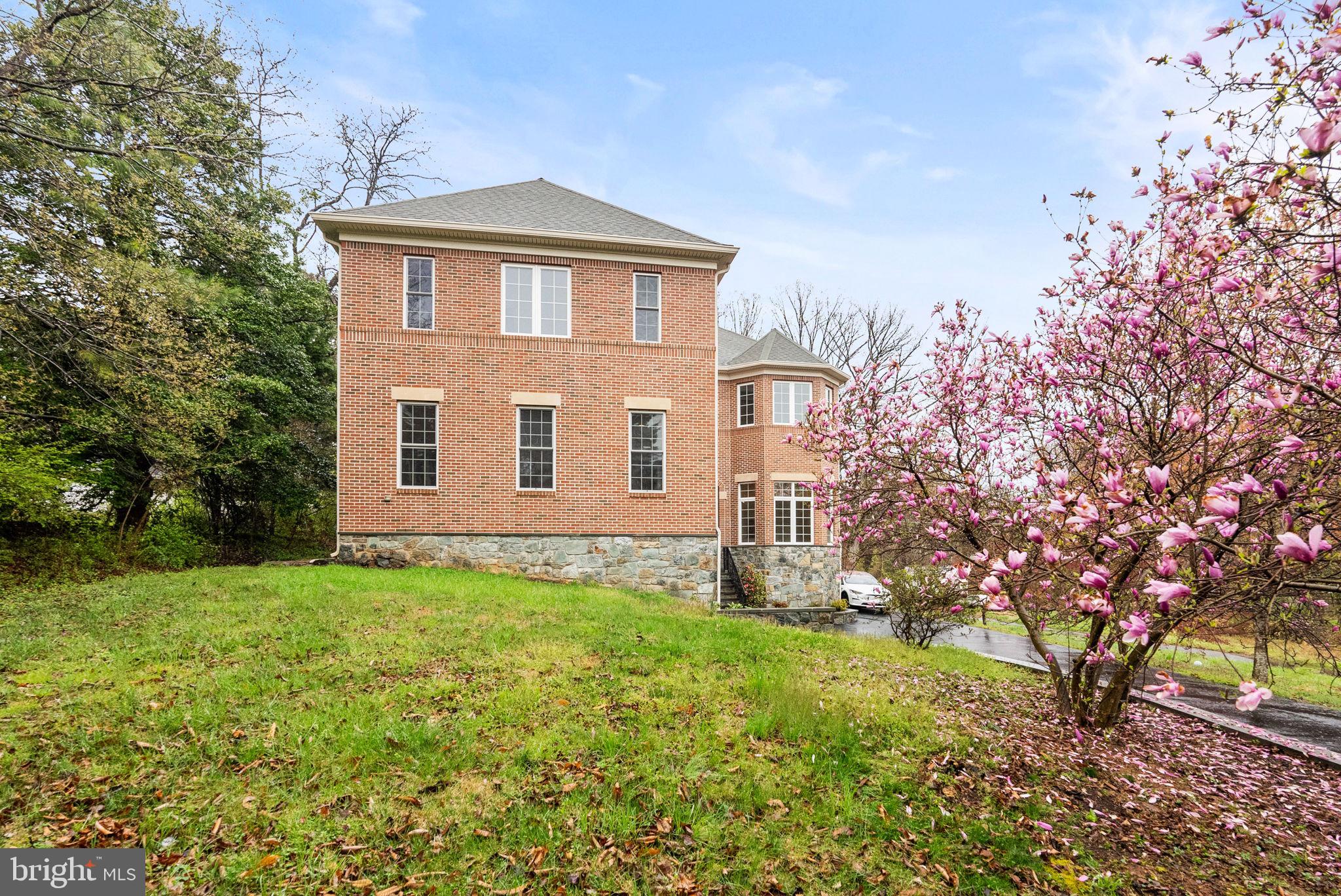 8522 Lewinsville Road McLean, VA 22102 - Photo 48 of 51 a front view of a house with garden
