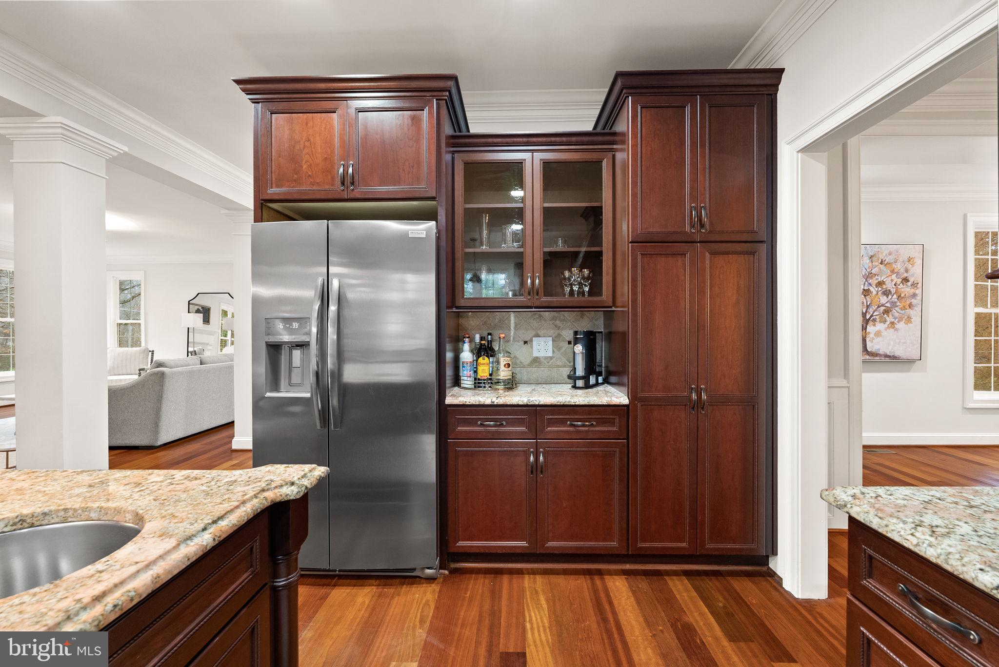 8522 Lewinsville Road McLean, VA 22102 - Photo 9 of 51 a kitchen with stainless steel appliances granite countertop a refrigerator and a sink
