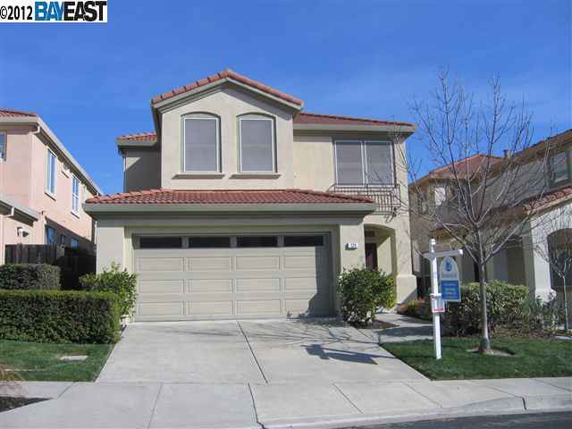 124 Pearlgrass Court San Ramon, CA 94582 - Photo 1 of 1 a front view of a house with garage