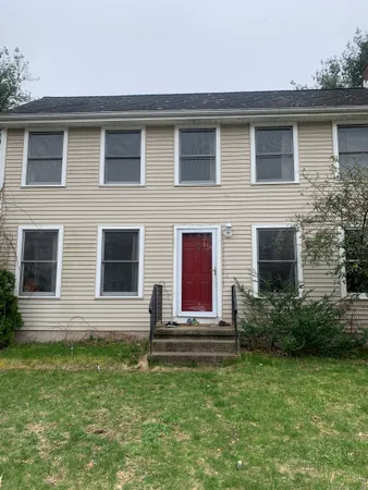 a front view of house with yard