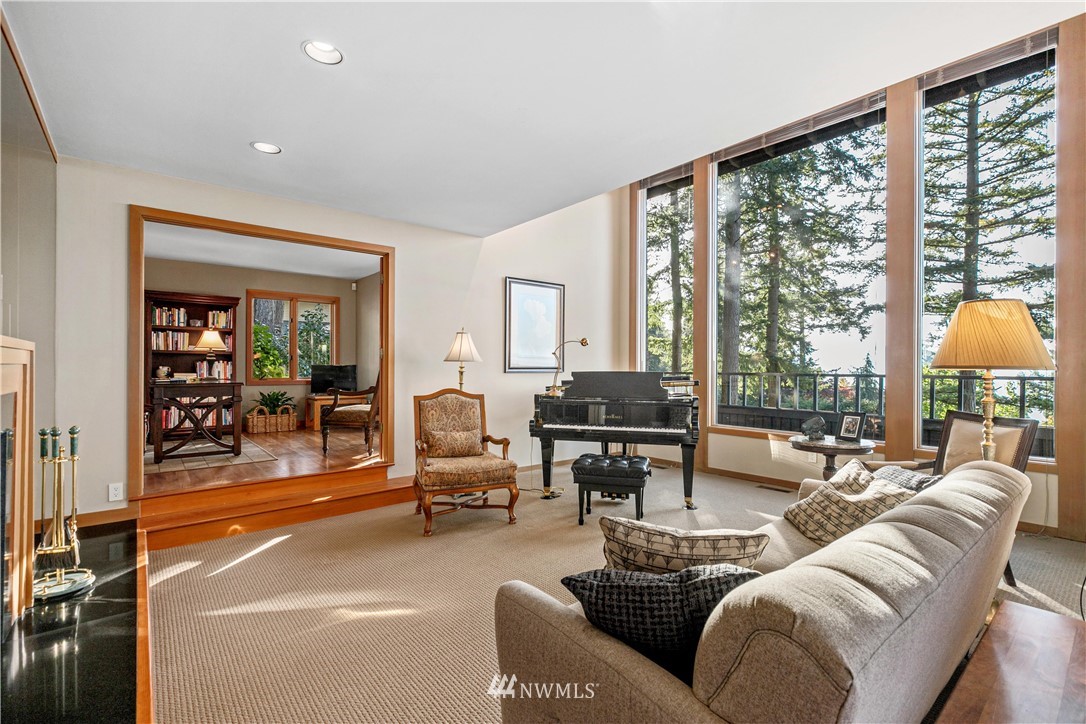629 Fieldston Road Bellingham, WA 98225 - Photo 13 of 25 a living room with furniture and a floor to ceiling window