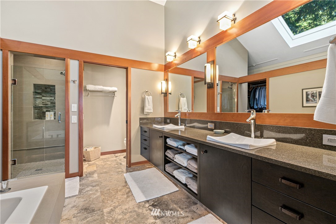629 Fieldston Road Bellingham, WA 98225 - Photo 20 of 25 a large bathroom with a glass door shower and sink