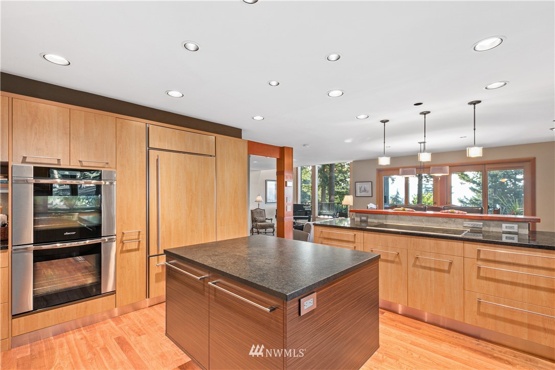 629 Fieldston Road Bellingham, WA 98225 - Photo 8 of 25 a kitchen with stainless steel appliances granite countertop a stove a sink and a refrigerator