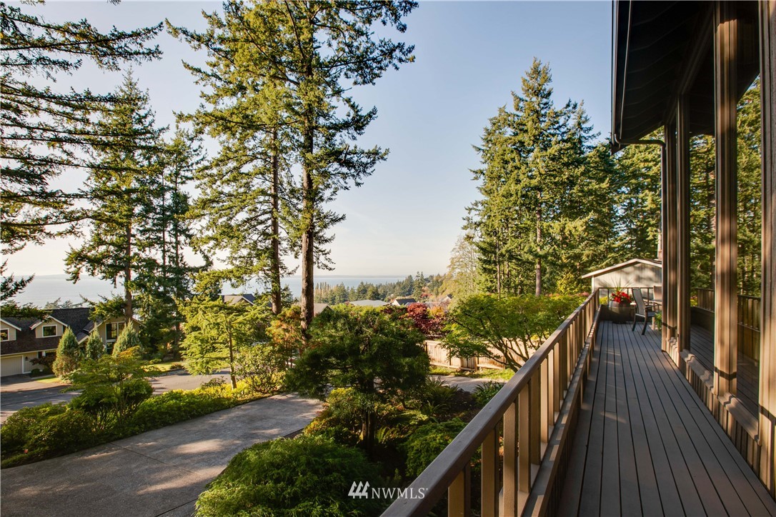 629 Fieldston Road Bellingham, WA 98225 - Photo 10 of 25 a view of a balcony with wooden floor and fence
