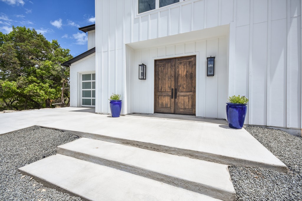 14910 Oklahoma Street Austin, TX 78734 - Photo 1 of 1 a front view of a house with a yard