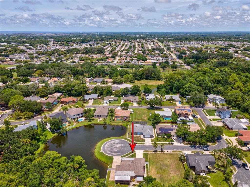 5904 Springrun Court Holiday, FL 34690 - Photo 51 of 53 an aerial view of residential houses with outdoor space