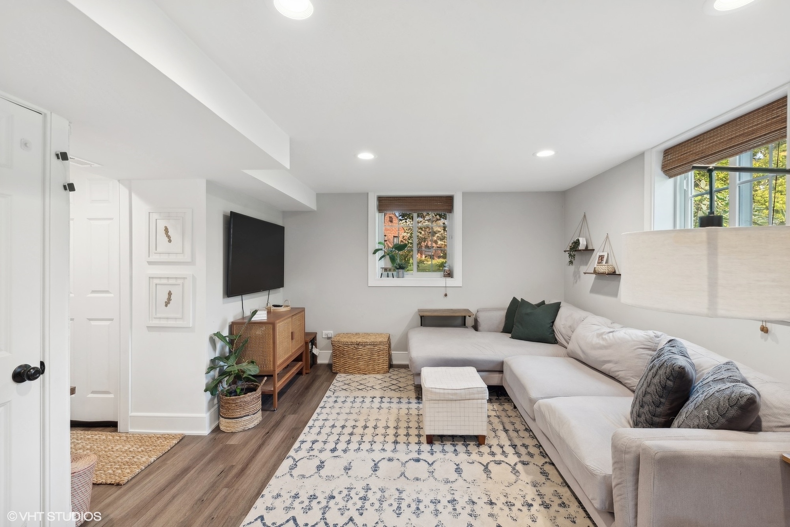 205 West Willow Road Prospect Heights, IL 60070 - Photo 20 of 30 a living room with furniture and a flat screen tv