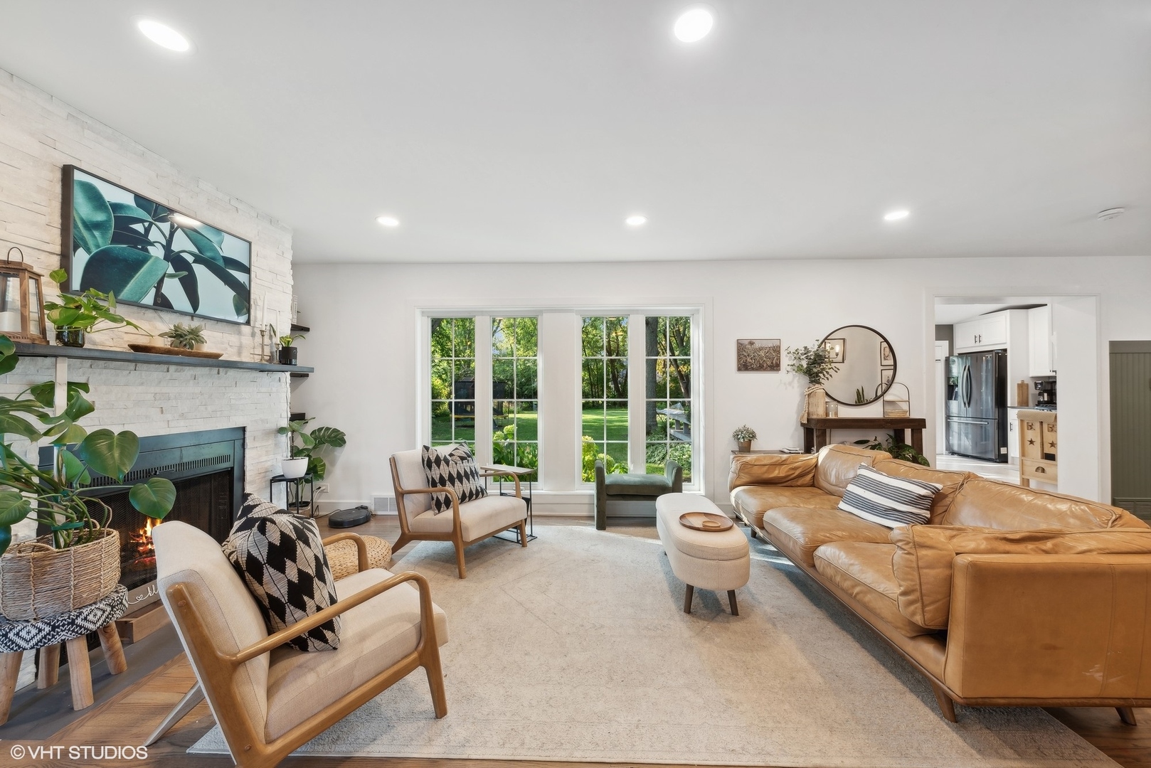 205 West Willow Road Prospect Heights, IL 60070 - Photo 5 of 30 a living room with furniture fireplace and flat screen tv