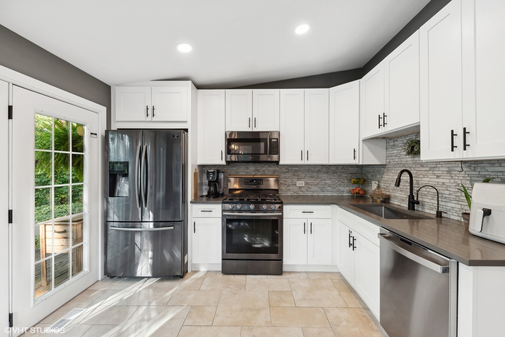 205 West Willow Road Prospect Heights, IL 60070 - Photo 9 of 30 a kitchen with a sink stove and refrigerator