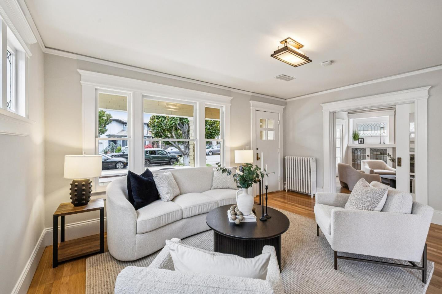 712 Crossway Road Burlingame, CA 94010 - Photo 12 of 90 a living room with furniture and a large window