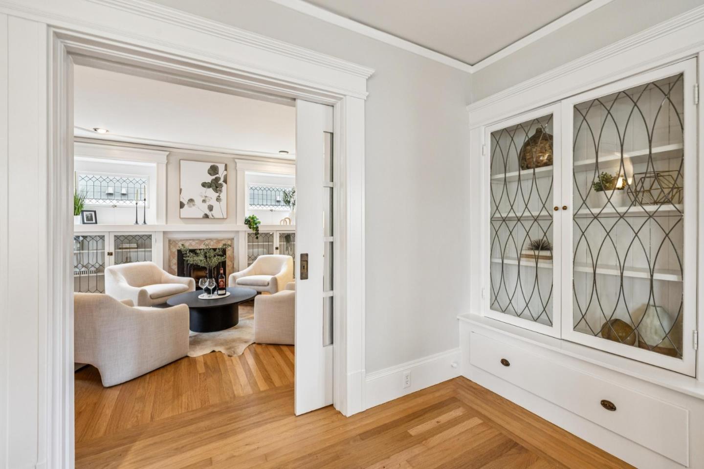 712 Crossway Road Burlingame, CA 94010 - Photo 15 of 90 a living room with furniture and a fireplace
