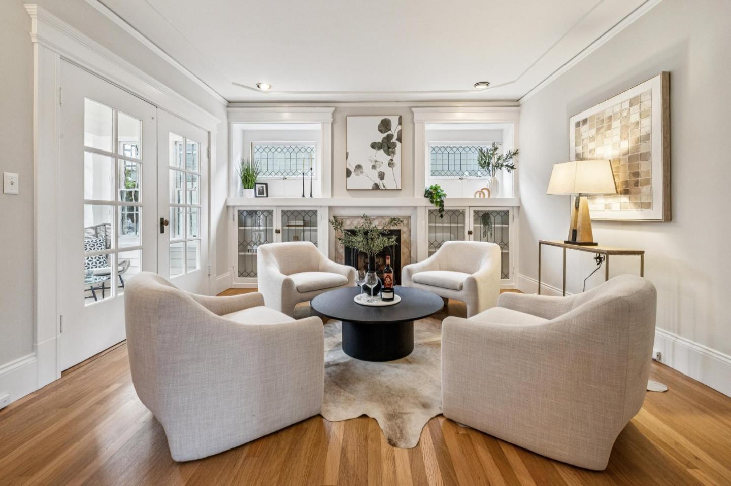 712 Crossway Road Burlingame, CA 94010 - Photo 18 of 90 a living room with fireplace furniture and a large window