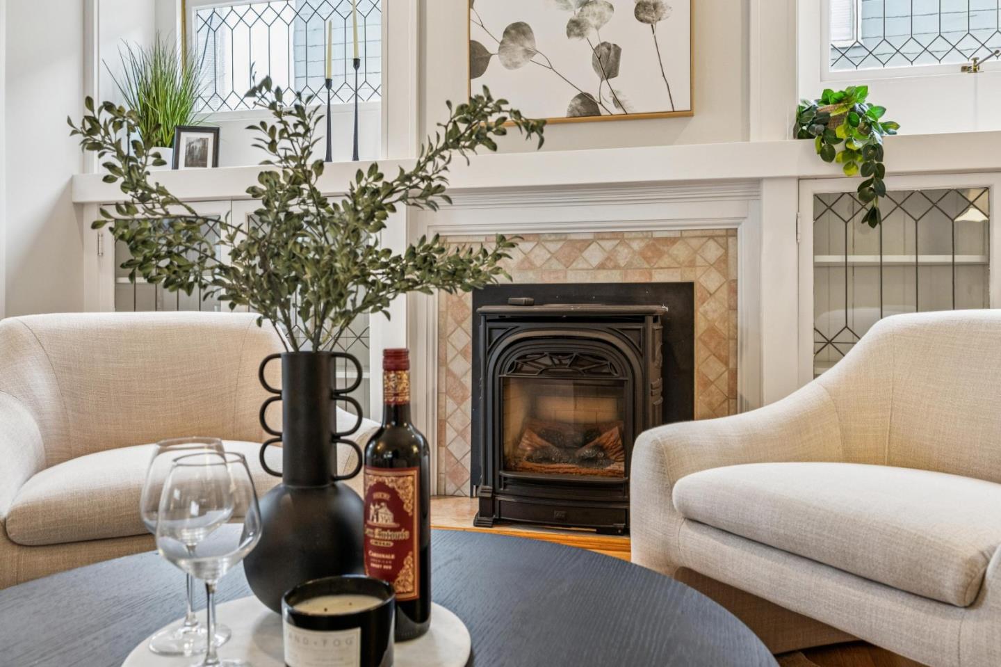 712 Crossway Road Burlingame, CA 94010 - Photo 21 of 90 a living room with furniture and a fireplace