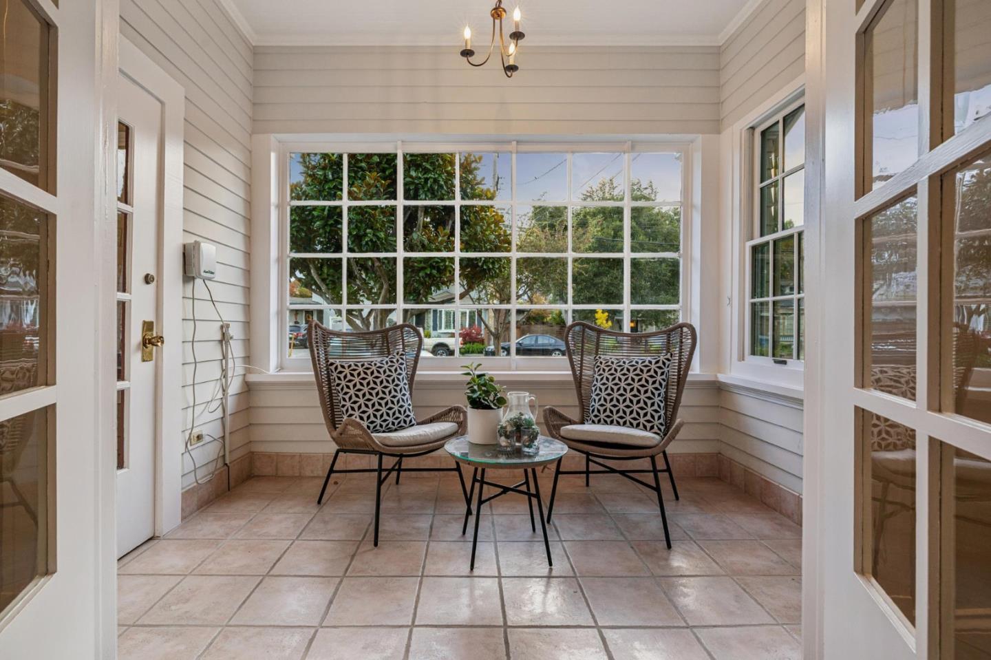 712 Crossway Road Burlingame, CA 94010 - Photo 24 of 90 a view of a chairs and table in a patio