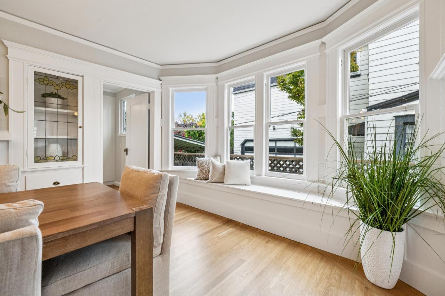 712 Crossway Road Burlingame, CA 94010 - Photo 32 of 90 a living room with furniture and large windows