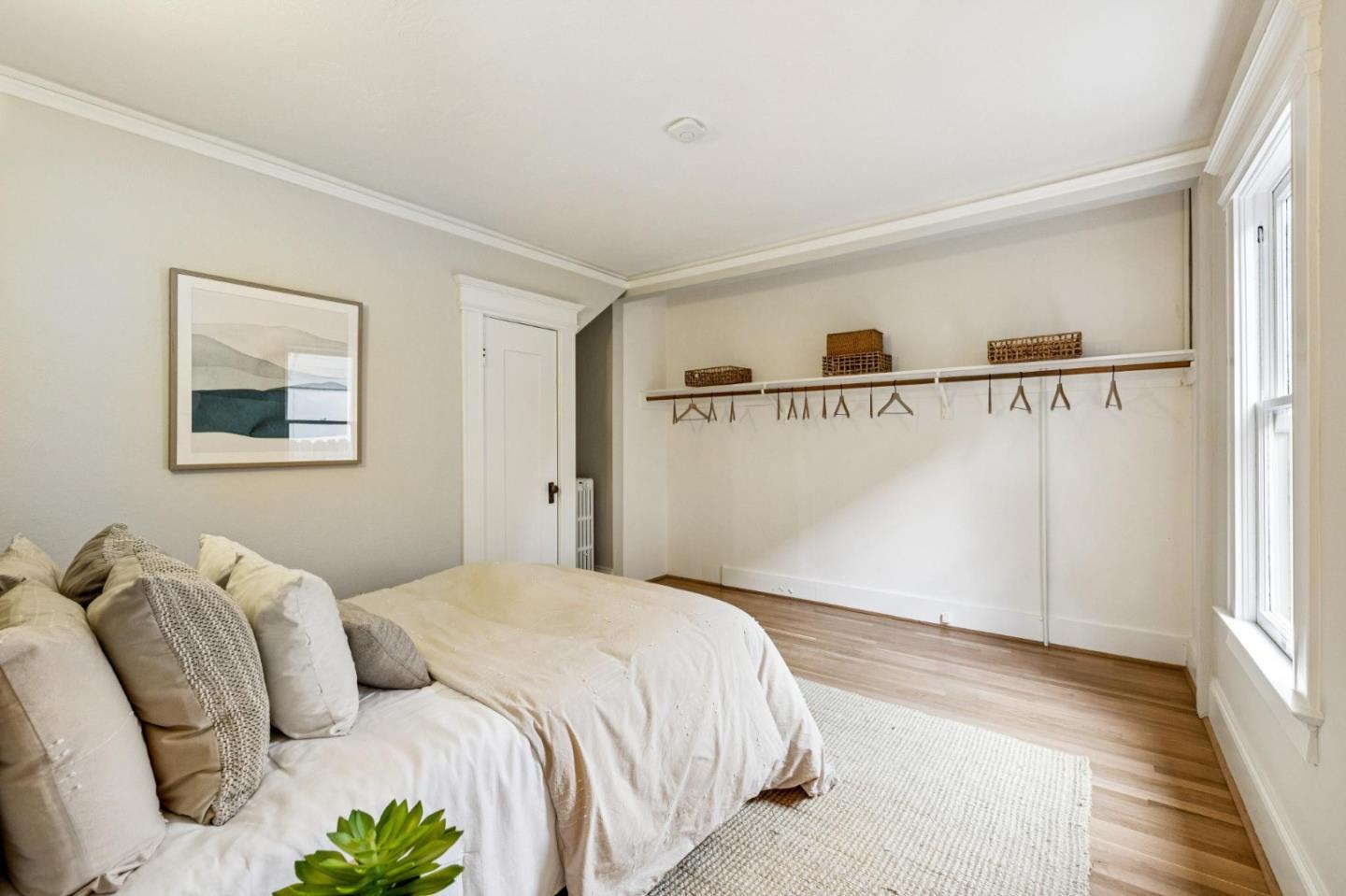 712 Crossway Road Burlingame, CA 94010 - Photo 46 of 90 a bedroom with a bed and a window