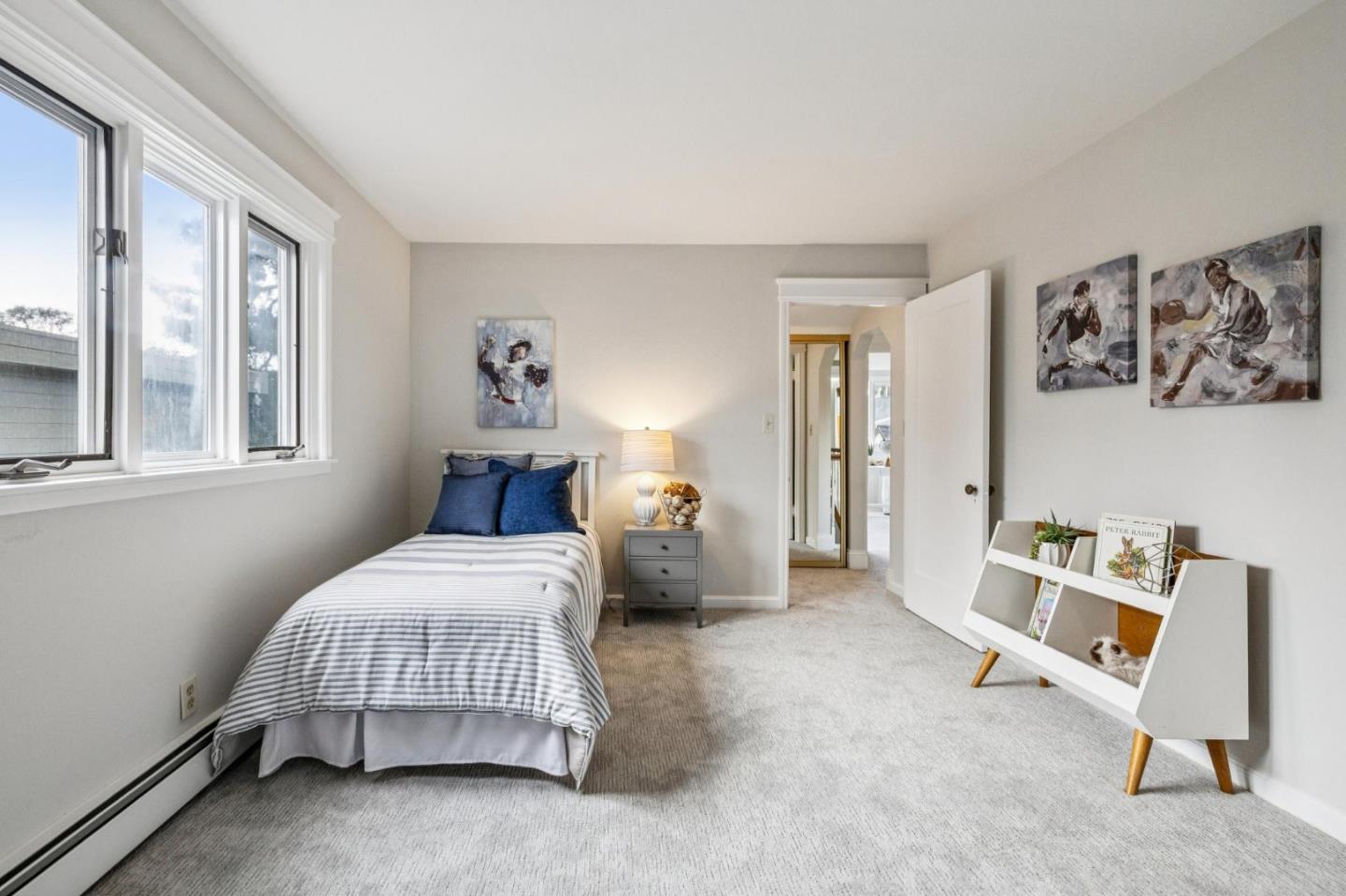 712 Crossway Road Burlingame, CA 94010 - Photo 69 of 90 a bedroom with a bed and a window